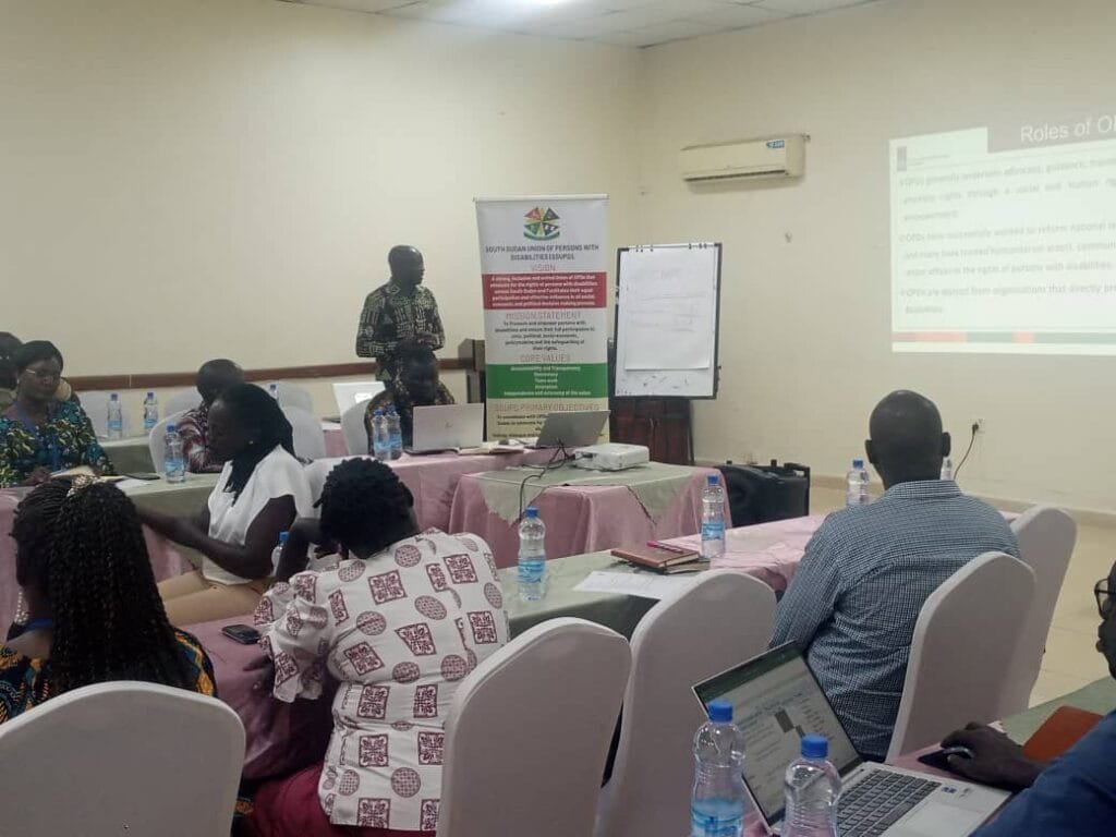 Photo above shows John ADF representative doing presentation roles of OPDs and why Involvement OPDs in programming is important.